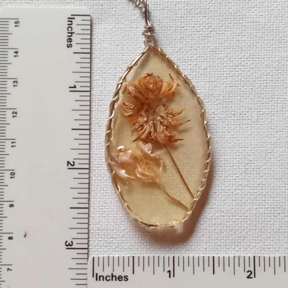 Large floral necklace, amulet